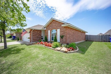 Ranch-style home featuring a front yard