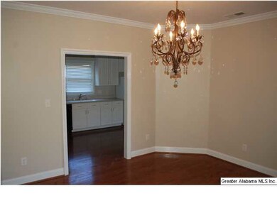 Open dining room with neutral colors.