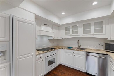 Kitchen featuring appliances with stainless steel