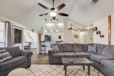 Living room with hardwood / wood-style flooring, c