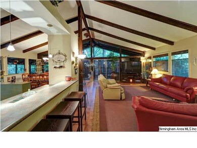 Breakfast  bar separates kitchen from living room.