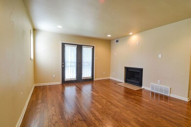 Gleaming hardwoods, French doors, recessed lightin
