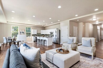 Great room featuring laminate wood finished floors and recessed lighting