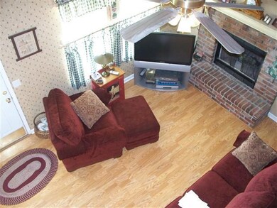 Looking down from balcony into Living Room