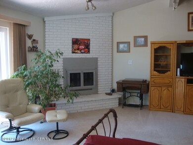 Living Room with Corner FP