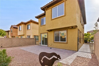Spacious backyard with pavers and minimal maintena