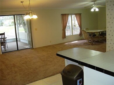 Living room and dining room viewed from kitchen