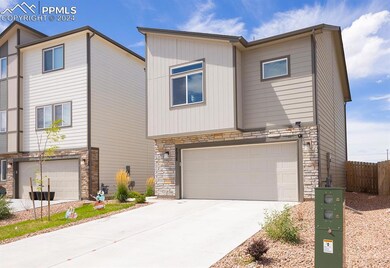 View of front of home with a garage