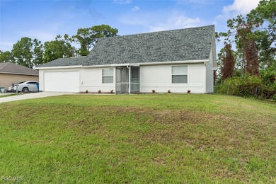 205 James Ave N, Lehigh Acres, FL 33971 - photo 2
