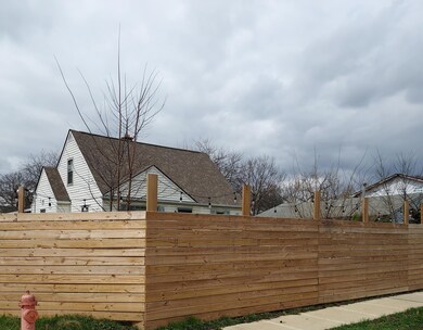 169 Stevens front privacy fence.
