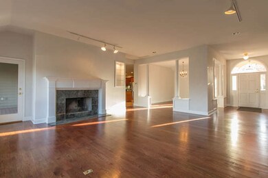Looking to the front door/dining room.  Access to 