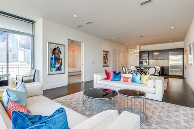 Living room featuring wood finished floors and recessed lighting
