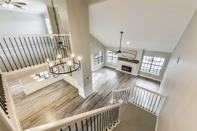Enjoy a stunning view from the upstairs landing ov