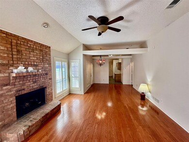 Unfurnished living room with visible vents, a ceil