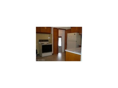 Freshly painted Eat-in Kitchen.  New Floor also pu