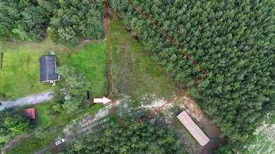 Aerial view of property's location with property parcel outlined