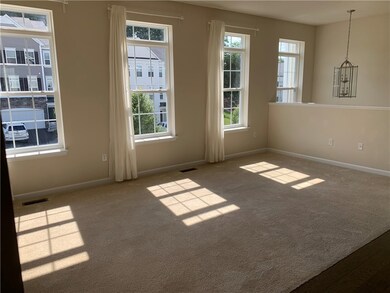 Living room with plenty of natural light.
