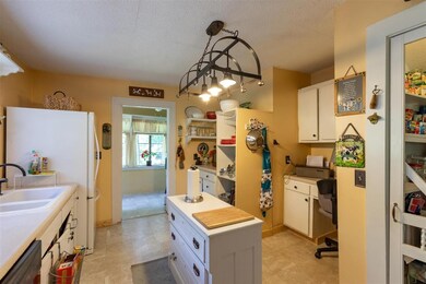 The kitchen has tons of cabinet and counter space!