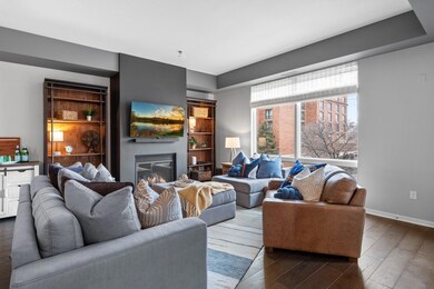 Cozy living room with fireplace & big windows