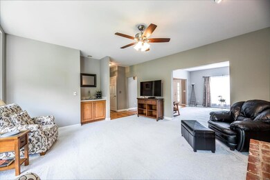 Family room with built-in wet bar ready for entert