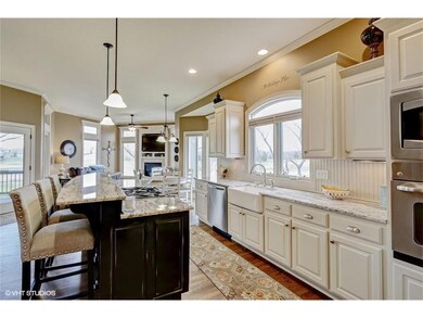 Ample cabinet space in the kitchen including a wal