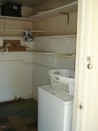 Laundry Area Behind Carport