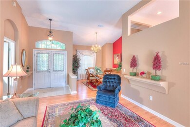 View of entry, living room & dining room with easy