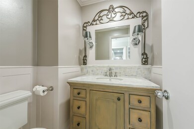 Updated powder room with board and batten wall acc