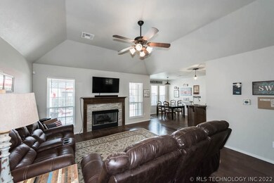 The living area opens into the kitchen and eating