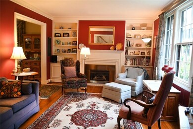 Living Room with beautiful hardwood floors and gas