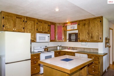 Center Island has tile top.