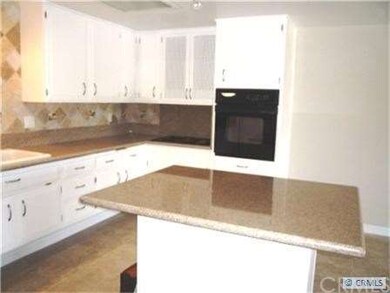 View of Kitchen toward built-in stove top and oven
