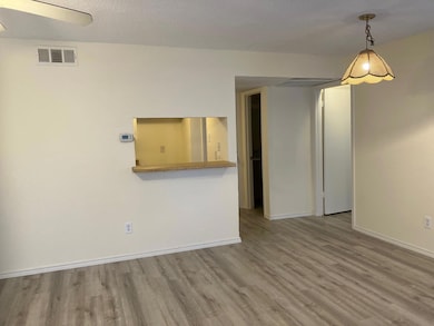 Empty room featuring hardwood / wood-style floors 