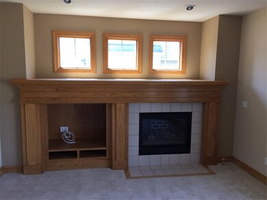 Gas fireplace in family room adjoining kitchen