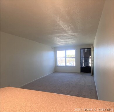 Breakfast bar overlooks into living room