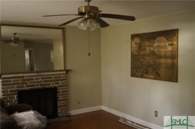 Wood burning fireplace in living room
