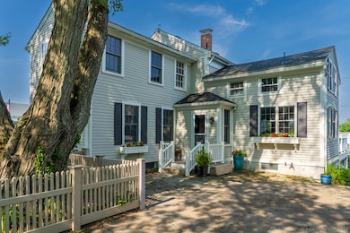 Rear yard and driveway can accommodate 2 cars for convenient access to the home.