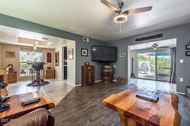 Living area, dining and office/den