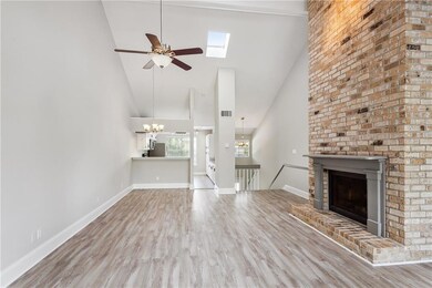 Spacious Living Room Opens to the Dining Room