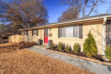 The home is nestled in the desired Colonial Acres 