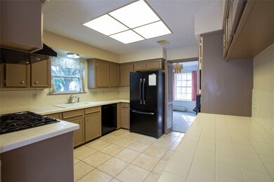 7726 White Fir Dr, Houston, TX 77088 - photo 6