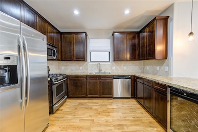 A chef’s dream, this gourmet kitchen boasts sleek