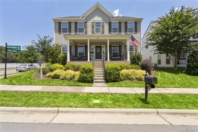 Professional landscaping on a desired corner lot.