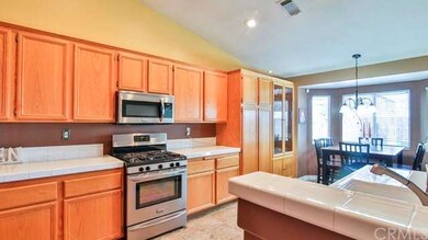 Open Kitchen with Stainless Steel Appliances