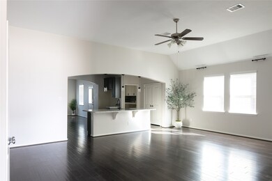 Living room flows seamlessly into the kitchen