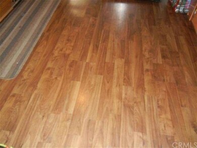 Laminate wood flooring throughout living areas