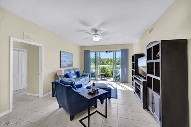 Living area featuring light tile patterned floors,