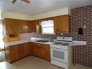 Kitchen. Dining room off kitchen for easy serving.
