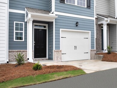 Pearson townhome exterior with blue color vinyl an
