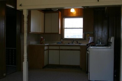 Kitchen - wall open to Kitchen - add a bar to comp